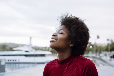 Portrait of young woman looking away