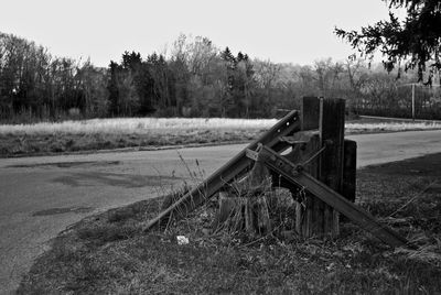 Wooden fence on grassy field