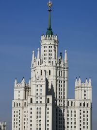 Low angle view of building against blue sky