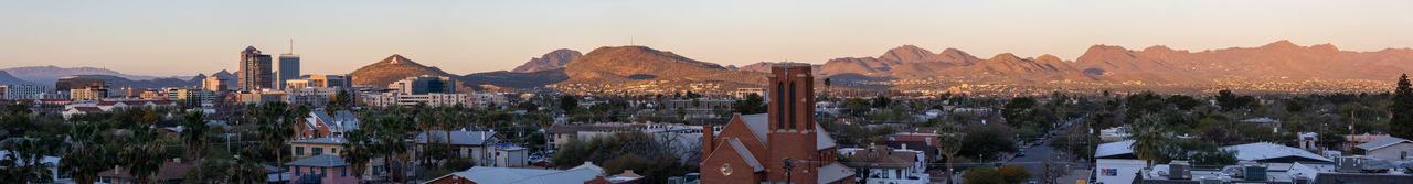 Tucson skyline at dawn with morning sun lighting the mountains