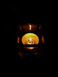 Close-up of illuminated light bulb