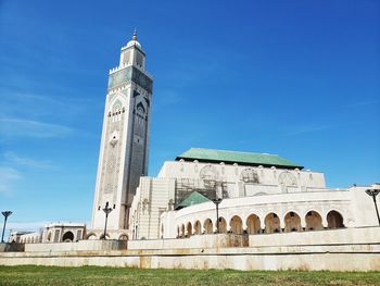 Low angle view of historical building against blue sky