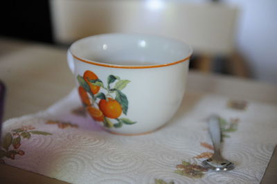 Close-up of tea cup on table