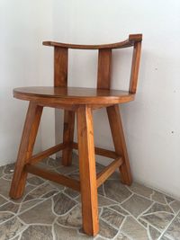 High angle view of empty chair on table at home