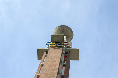 Low angle view of clock tower against sky