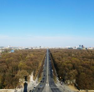 Panoramic view of bridge in city against clear sky