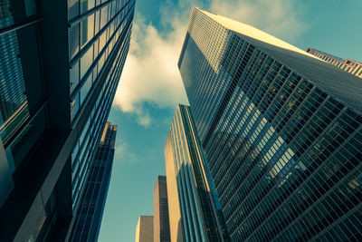 Low angle view of modern buildings against sky
