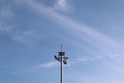 Low angle view of street light against sky