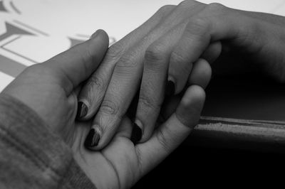 Close-up of couple hands