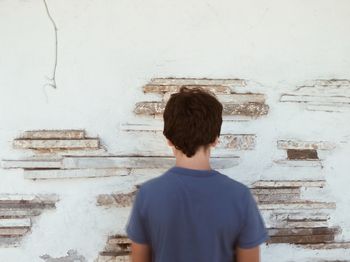 People standing in front of tree