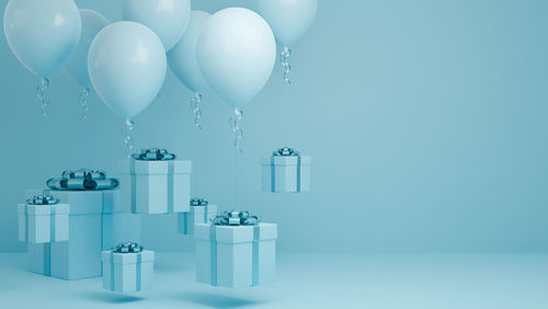View of balloons against blue background