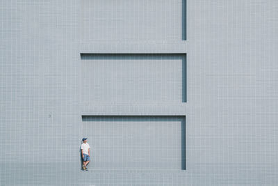 Full length of man walking in building