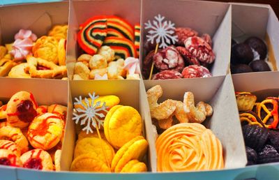 Close-up of cookies and chocolates in the christmas gift box