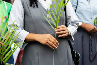 Catholics are seen participating in the palm sunday procession in the city of salvador, bahia.
