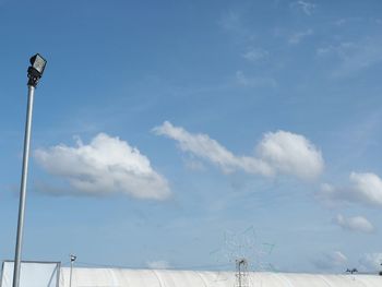 Low angle view of street light against sky
