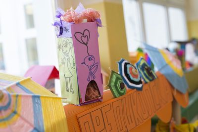 Close-up of drink umbrellas and decoration in workshop