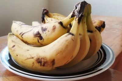 Close-up of fruit in plate on table