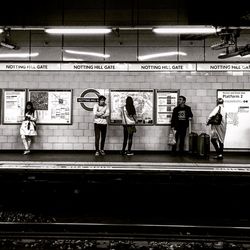 People at railroad station platform