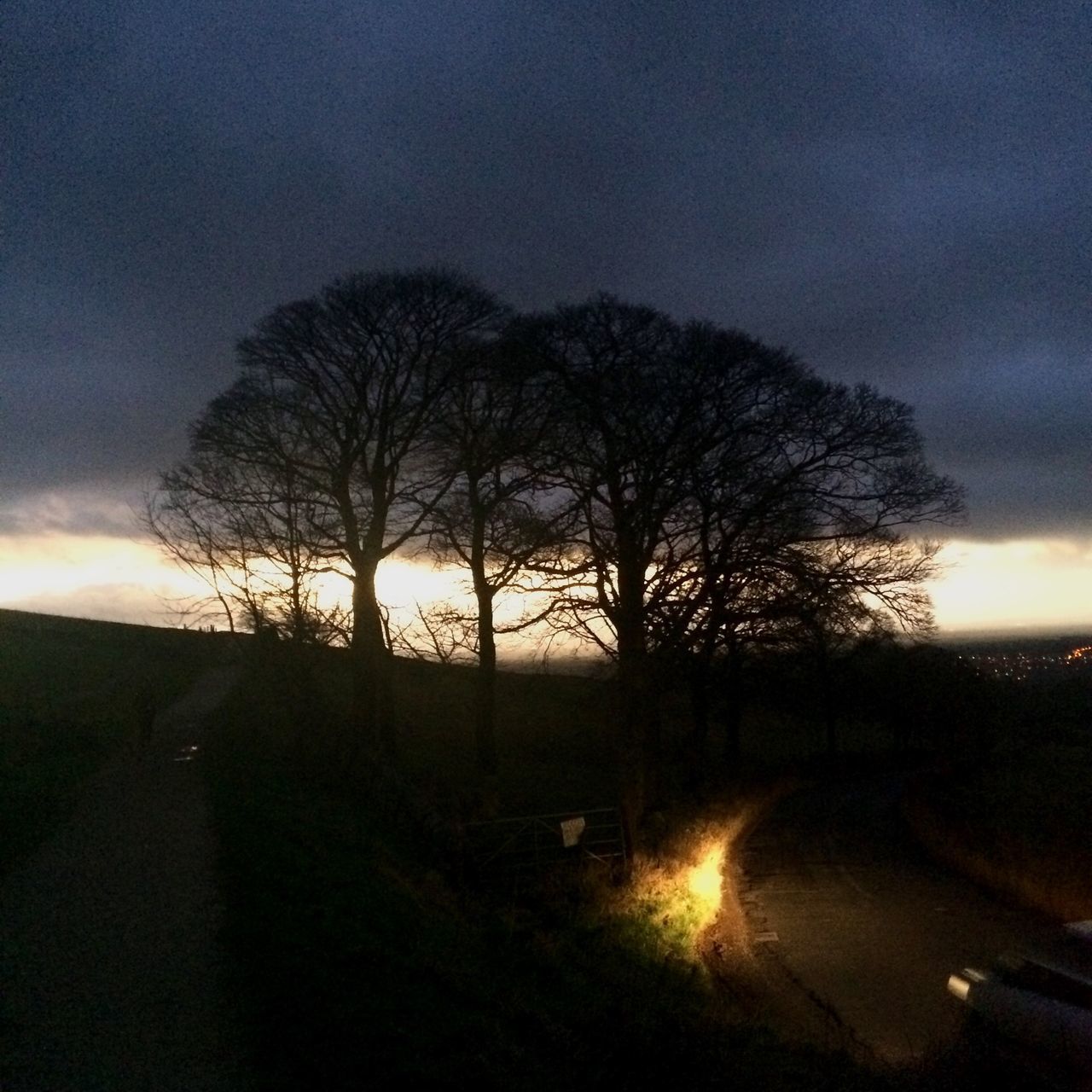 VIEW OF ROAD AT SUNSET