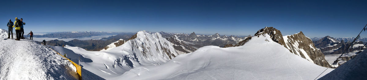 Scenic view of snow covered mountains