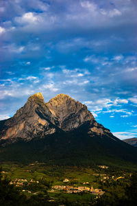 Scenic view of mountains against sky