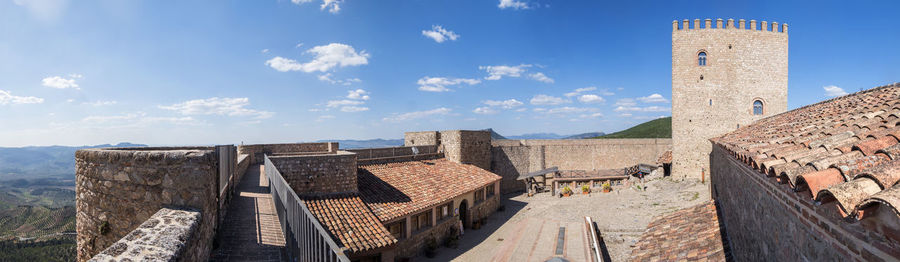 Low angle view of old ruins against sky