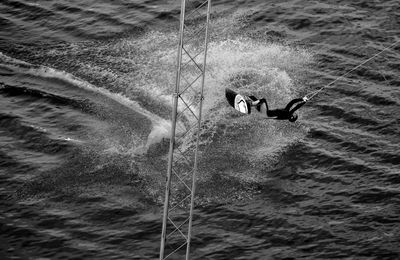 Man kiteboarding in sea