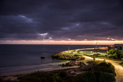 Scenic view of sea against sky at sunset