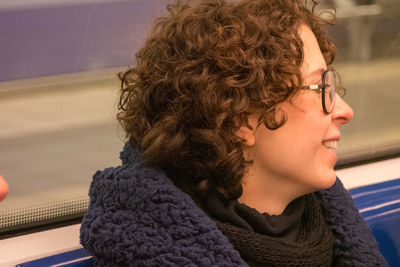 Close-up portrait of woman looking away