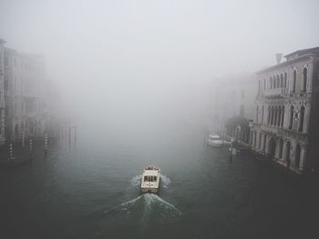 High angle view of buildings in foggy weather