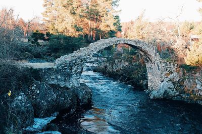 Arch bridge over river