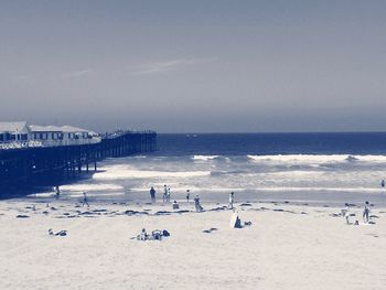 Scenic view of beach against clear sky