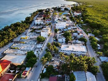 High angle view of townscape by sea