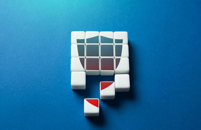 Close-up of toy blocks on blue background