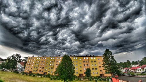 Building against cloudy sky