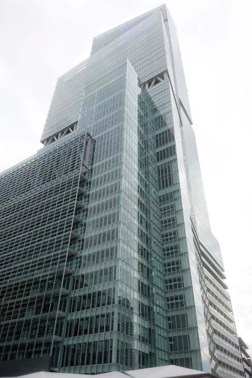 architecture, building exterior, built structure, skyscraper, low angle view, city, day, outdoors, tower, no people, sky, downtown district, office block