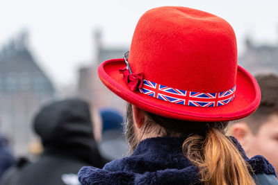 Rear view of man with red hat