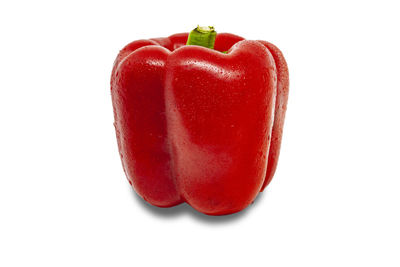 Close-up of red bell pepper against white background