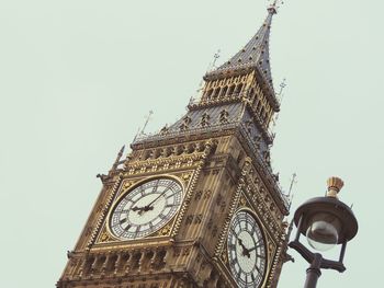 Low angle view of big ben against sky