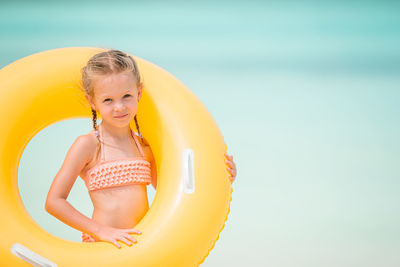 Portrait of a smiling woman in swimming pool
