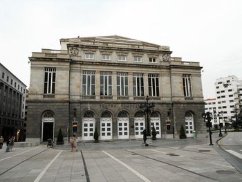 Facade of old building against sky