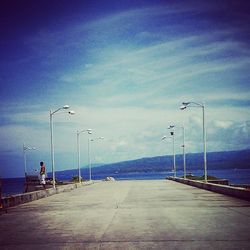 Empty road along sea