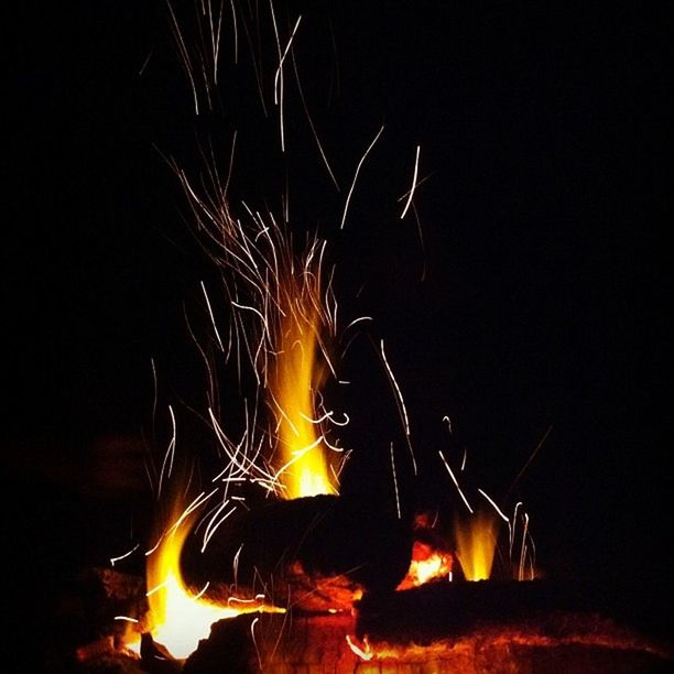 night, fire - natural phenomenon, burning, flame, heat - temperature, illuminated, glowing, fire, bonfire, long exposure, dark, motion, firewood, campfire, sparks, copy space, celebration, heat, light - natural phenomenon, lit