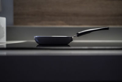 Close-up of spoon on table at home