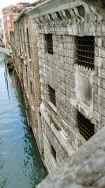 View of canal along buildings