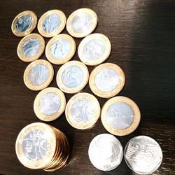 Close-up of coins on table