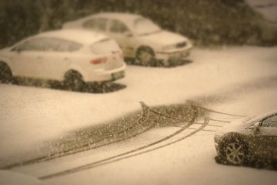 Close-up of car on snow
