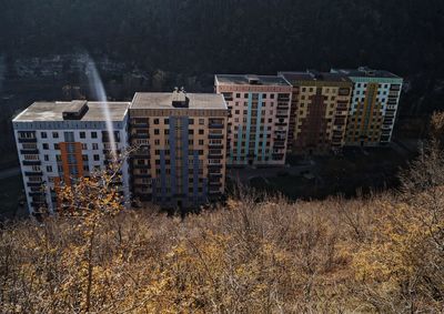 High angle view of abandoned buildings on field