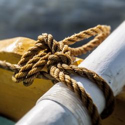 Close-up of ropes tied on rope