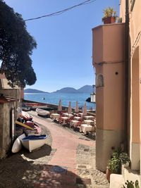 Buildings by sea against clear sky, tellaro